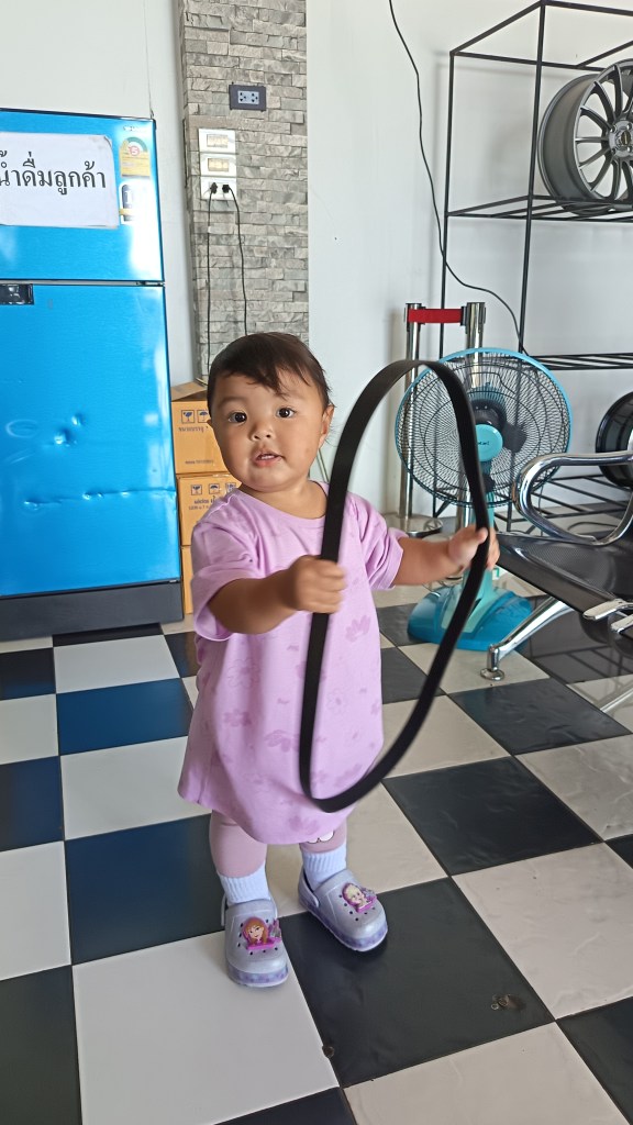 My Doughter playing with the old belt. Lets see what the future holds maybe our next mechanic???
